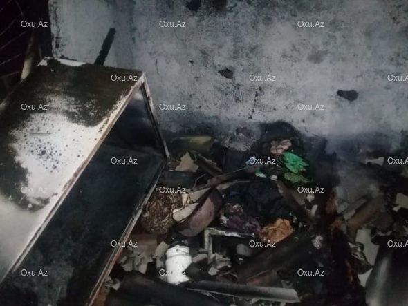 Zibil atmağa gedən qadının evi yanaraq kül olub - FOTO