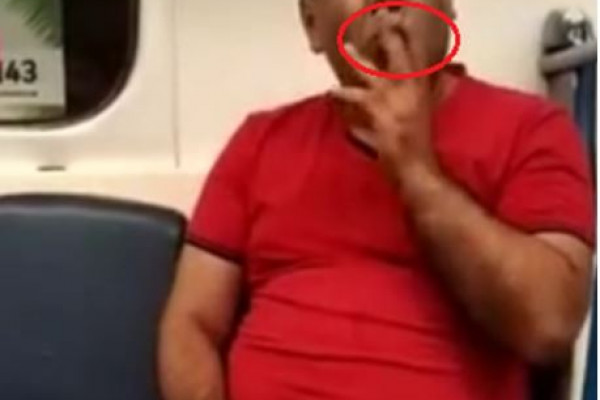 Bakı metrosunda biabırçılıq- Qatarda siqaret çəkdi (VİDEO)