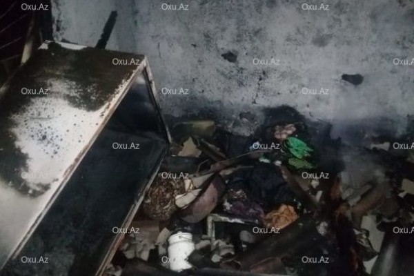 Zibil atmağa gedən qadının evi yanaraq kül olub - FOTO