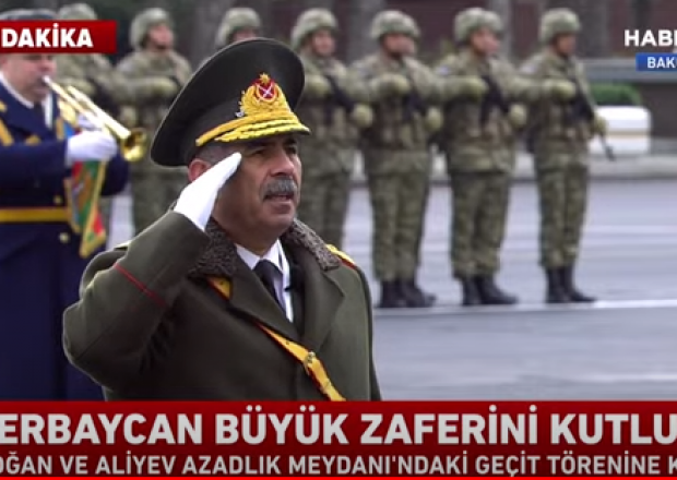 Zakir Həsənov Zəfər paradında raport verdi